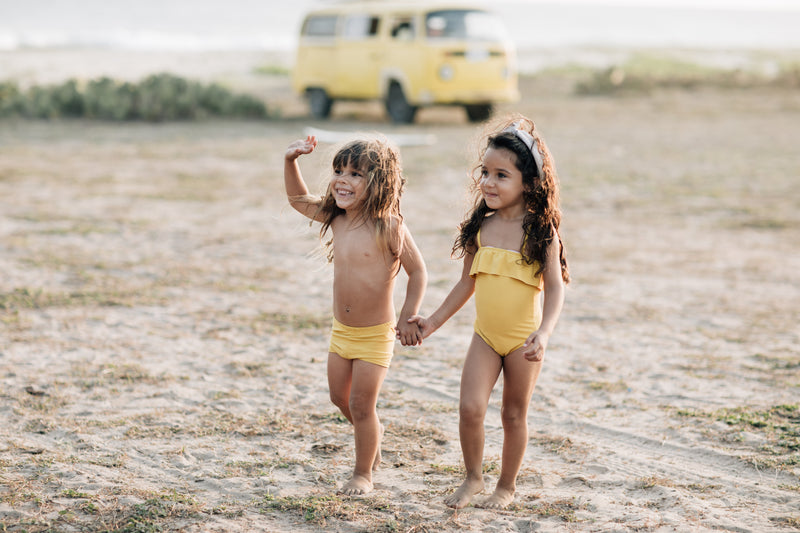 Yellow swimming trunks for boys